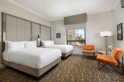 Settle into two plush queen beds for restful nights.