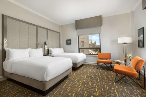 Gaze out at the city from your bed in comfort.