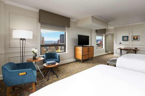Lounge by the window and savor sweeping city scenes.