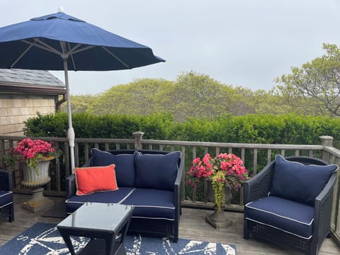 Comfortable patio furniture completes the outdoor living spaces. 