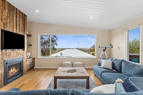 Perched high to capture breathtaking vistas of the Bluff, estuary, and ocean