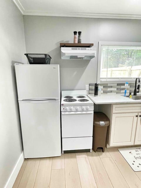 Includes stove, microwave, fridge, and everything needed for cooking.