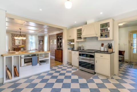 Kitchen looking toward dining room and mud room.