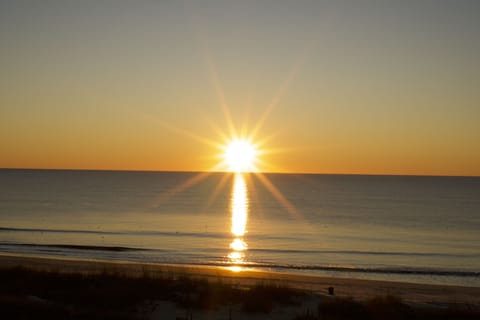Sunrise from private penthouse balcony