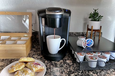Keurig with complementary Starbucks coffee, hot chocolate and Tazo tea to enjoy.