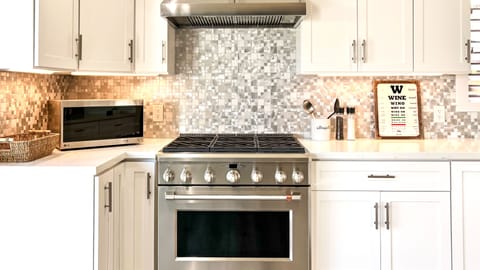 Remodeled in 2019 w/ gorgeous cabinetry, quartzite counters, designer tile, etc.