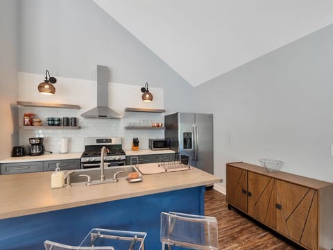 Bar seating for three at the kitchen island.