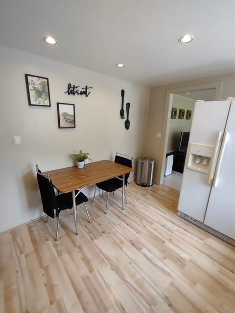 Kitchen fully stocked with dishes and cooking utensils