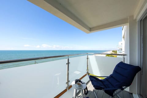 Relax with a morning coffee or cold drink at sunset from your private balcony.