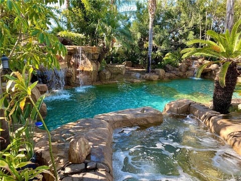 Tropical Rock Pool with Slide and Waterfalls