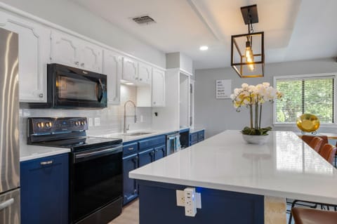 The huge island is large enough for your biggest meals with family and friends.