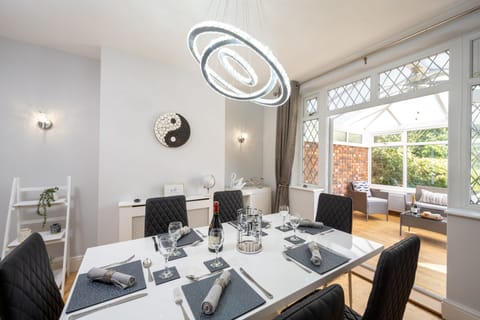 Dining Room seats 6 guests in a modern and stylishly designed atmosphere