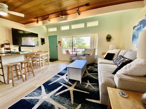 Open floor plan with plenty of seating and 65" Smart TV w/Fire Stick 4K Ultra