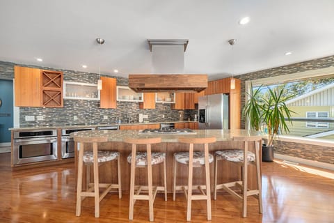 Dining seating for 10 at table and 4 at island. Plenty for the whole group!