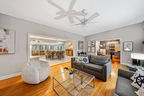 Bright, spacious home with hardwood floors and an open layout. Cozy living room, large dining area for gatherings, and a dedicated office for remote work. Stylish décor, great natural light, and comfortable furnishings throughout.