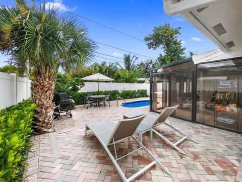 An outside lounge area overlooking the beautiful pool area. We are less than a mile walk to the Ocean, Restaurants and Bars.