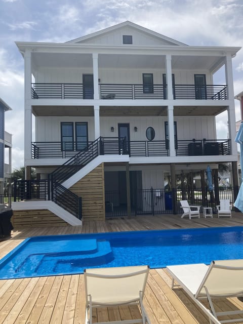 6 loungers + 2 adirondack chairs + table and 4 chairs + 2 umbrellas