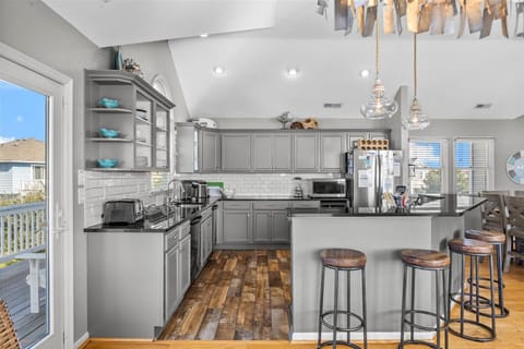 Kitchen - Modern designs and stainless appliances make this kitchen an entertainer's dream.