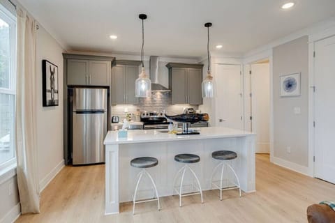 Full kitchen with island and pantry