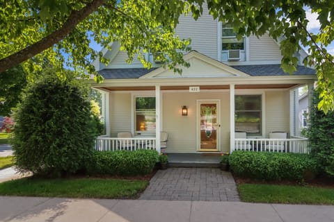 Charming front porch with chairs for coffee 