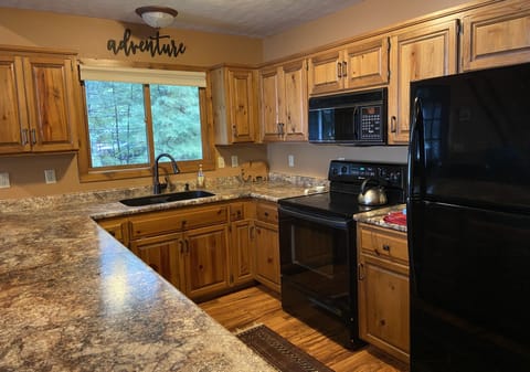 The Kitchen with a dining peninsula