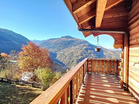 Sky, Plant, Property, Mountain, Building, Tree, Wood, Natural Landscape, Fence, Shade