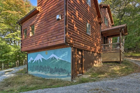 Exterior | Hand-Painted Mountain Mural | 'Painted Peaks' Cabin