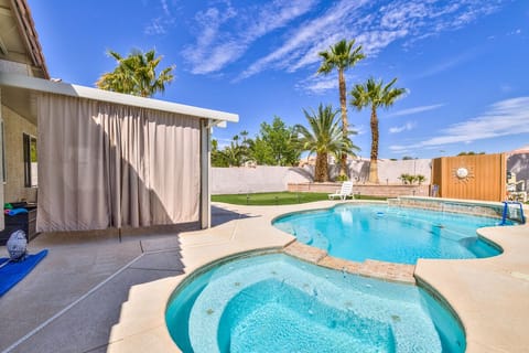 Heated pool/spa with green padding, golf sticks balls and sticks. POOL NOT GATED