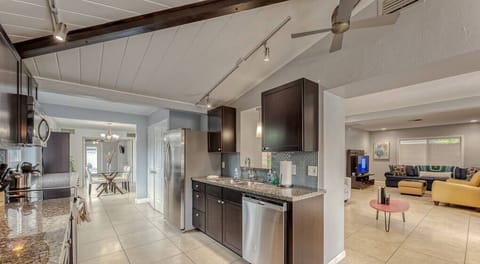 MAIN HOUSE KITCHEN #1- Fully Appointed Updated Kitchen with Stainless Steal Appliances (Microwave, Refrigerator, Ceramic Cooktop & Oven, Dishwasher, Toaster, Regular Drip Coffee Maker & Fully Stocked with Pots/Pans, Baking Pans, Dishware, Silverware & Glassware.