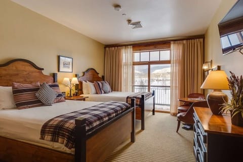 Wake up to mountain views from cozy double queens.
