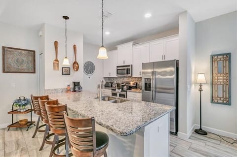 Kitchen with bar stools