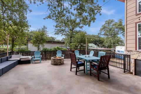 Firepit on one of the patios. Dim lighting with lake view 