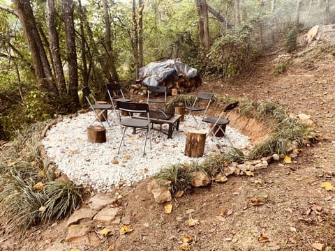Firepit with log beverage tables
