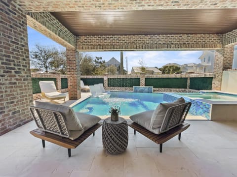 Summerwind | Outdoor Entertainment Area | Heated Pool | Outdoor Kitchen