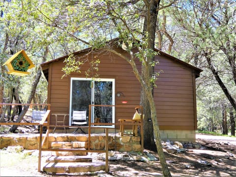 Private patio area with suet, seed and nectar bird feeders w/ seating to enjoy.