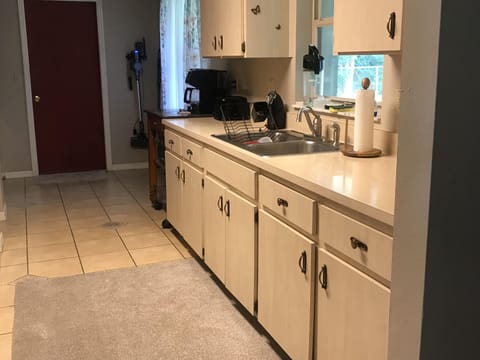 Kitchen cabinets and coffee station