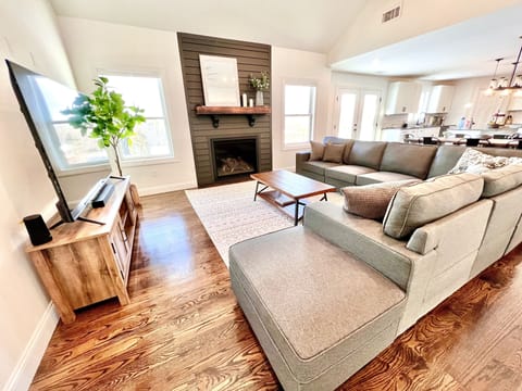 Living Room: sectional easily seats 8, gas fireplace, 70" smart TV