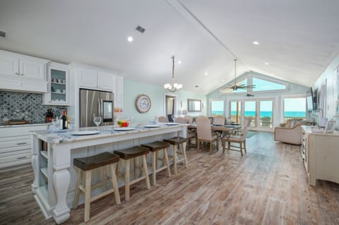 Main area. Bar has seating for 4 and the dining room table seats 8