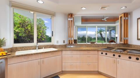 Additional bar seating in the family room to the kitchen.