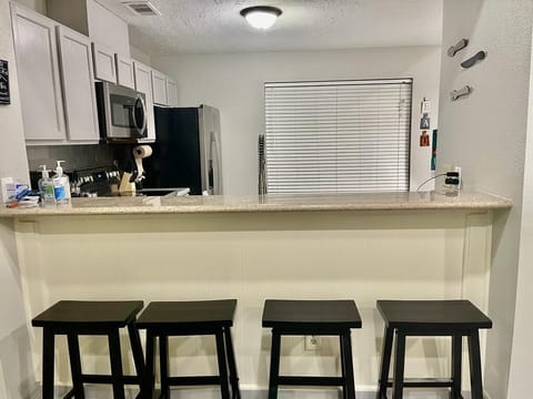 Bar stools for additional guest with buffet arrangement.