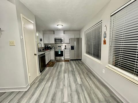 The Kitchen with all stainless steel appliances.