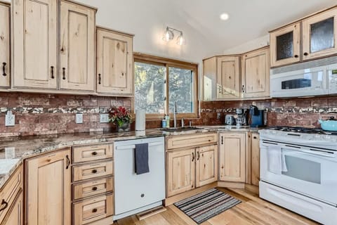 (Main Level) Beautiful kitchen, spacious with lots of counter room for meal prep.