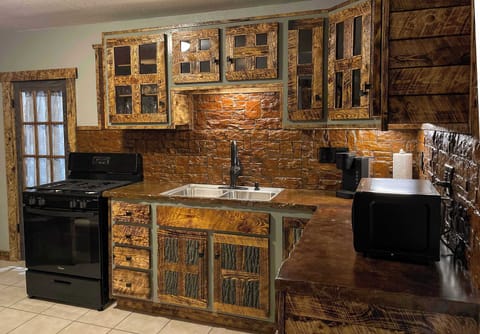 Custom Rustic Kitchen with Unique Handcrafted Finishes