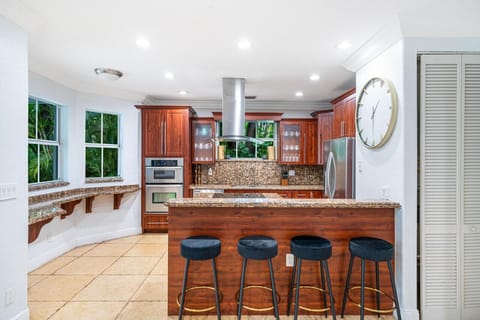 Cook in a fully equipped kitchen with modern appliances & ample counter space.