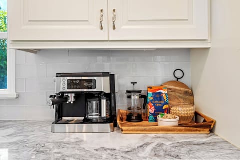 De'Longhi espresso and coffee machine.  Coffee and tea provided