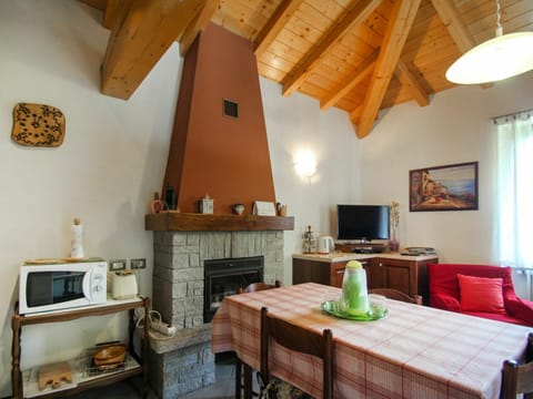 Furniture, Property, Table, Building, Wood, Orange, Interior Design, Home Appliance, Living Room, Flooring