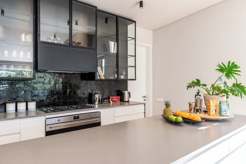 Kitchen is located on the upper level. 