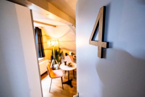 Room 4 
A glimpse into your room on the top floor — warm lighting and soft textures.