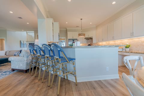 Kitchen features breakfast bar for additional seating