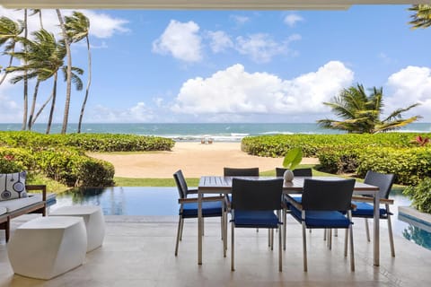 The patio runs the length of the Villa, alongside the pool.